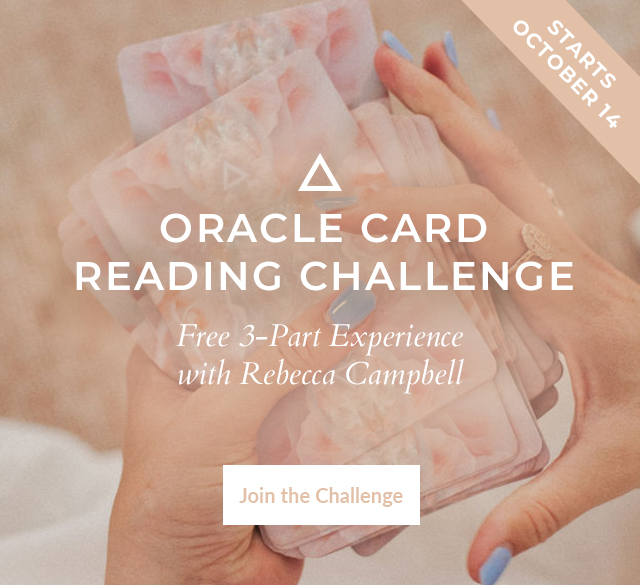 Promotional banner for the Oracle Card Reading Challenge, a free 3-part experience with Rebecca Campbell starting October 14. Features hands shuffling pink-toned oracle cards, a soft peach overlay, and a beige 'Join the Challenge' button. Text reads: 'Embrace the Magic of the Moon’s Phases.'